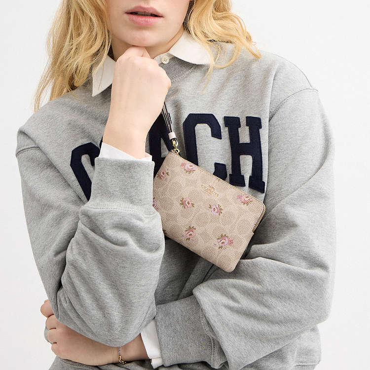 COACH - MUÑEQUERAS (CORNER ZIP WRISTLET)