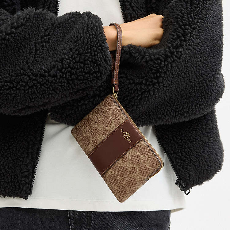 COACH - MUÑEQUERAS (CORNER ZIP WRISTLET)