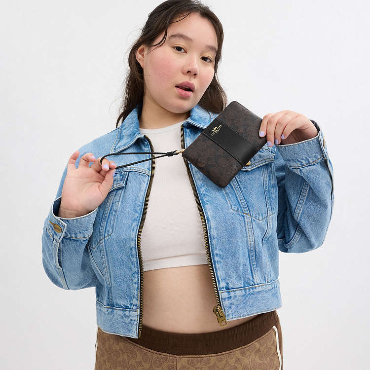 COACH - MUÑEQUERAS (CORNER ZIP WRISTLET)